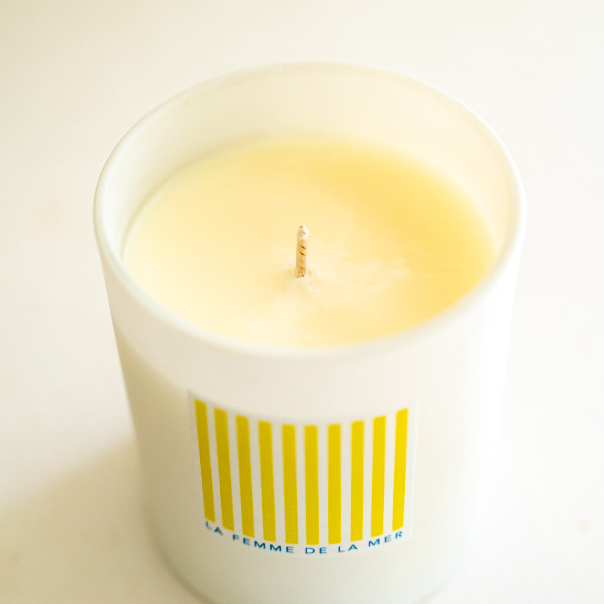 beach scent candle container 8 oz white and yellow stripes label